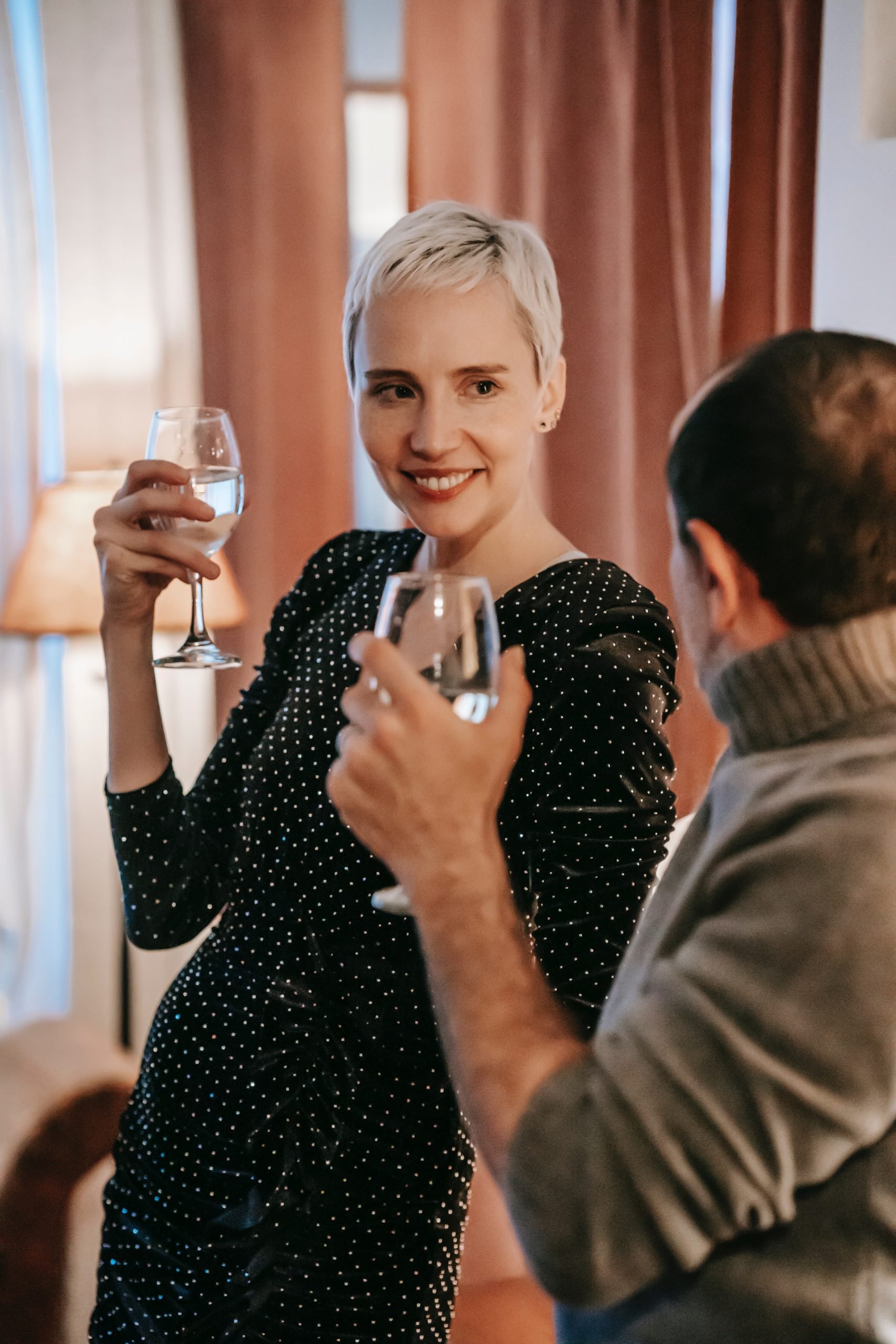 Man and woman drinking wine