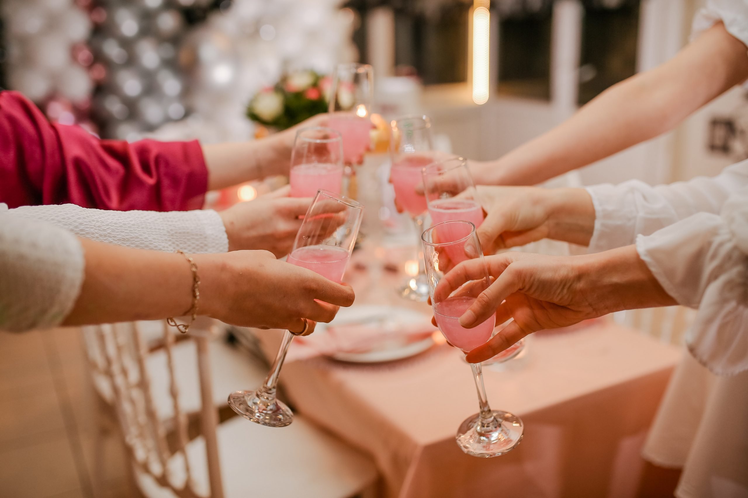 People toasting rose