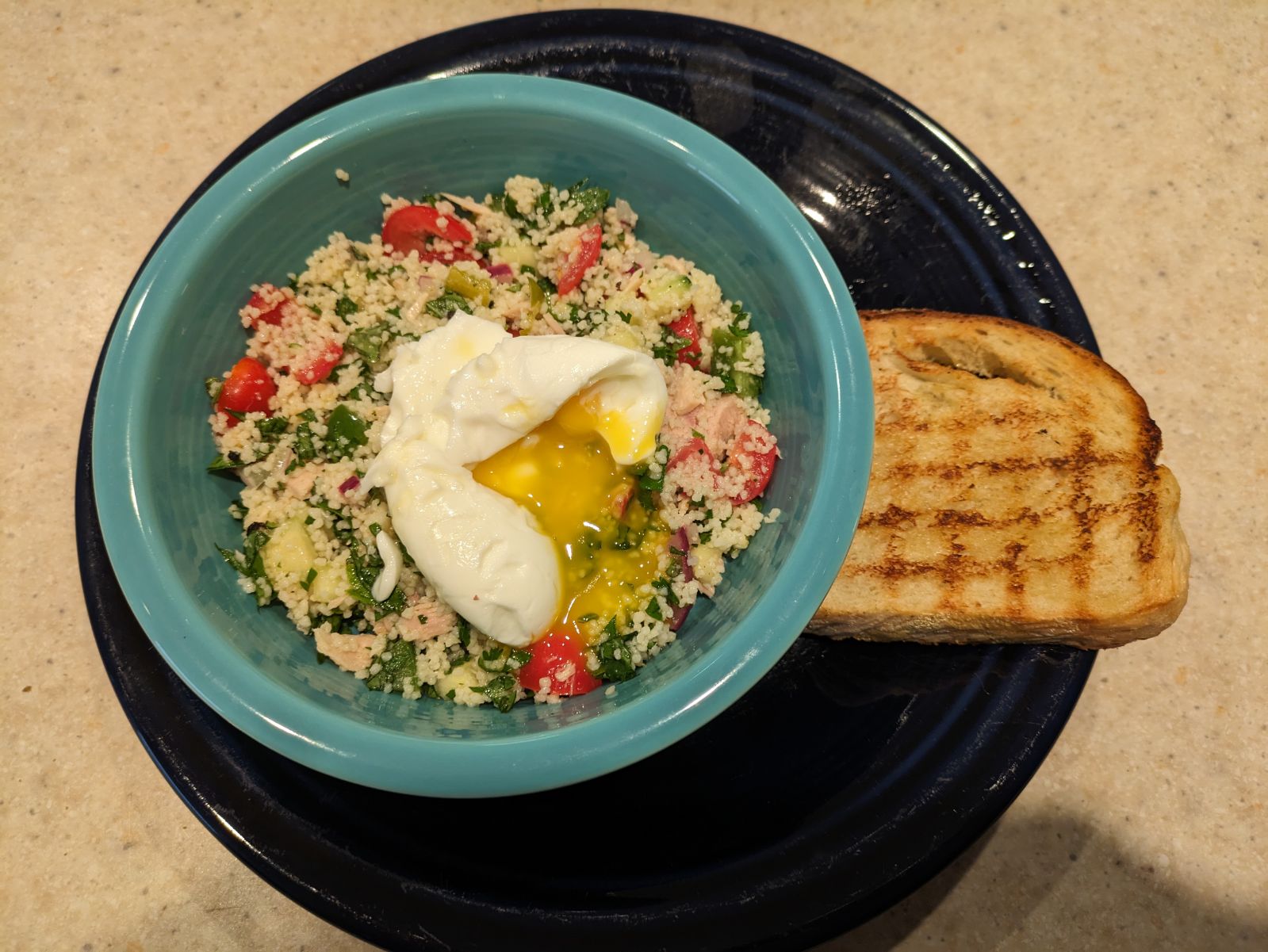 Bowl of couscous salad Nicoise